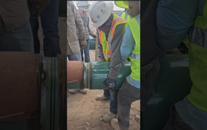 Construction of an internally coated wet sour gas pipeline using CCB weld-zone sleeves