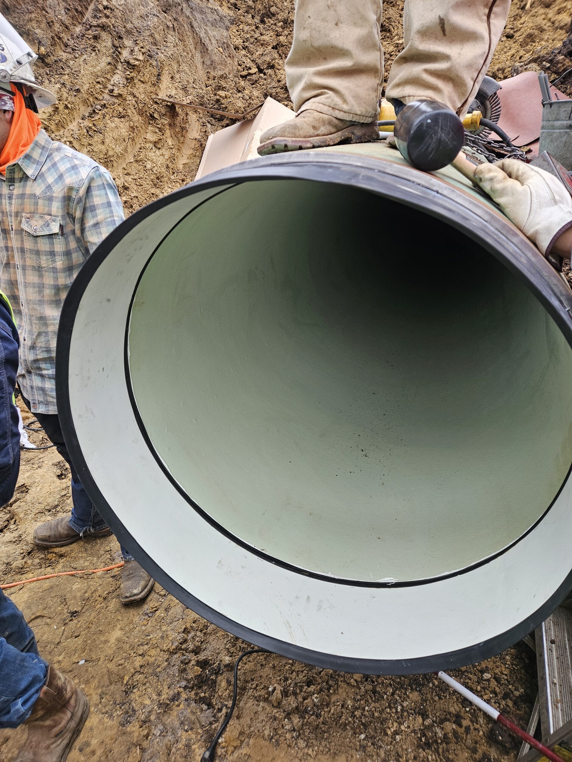 Interior of a 36-inch lined steel pipe prepared for a FlexSleeve tie-in joint